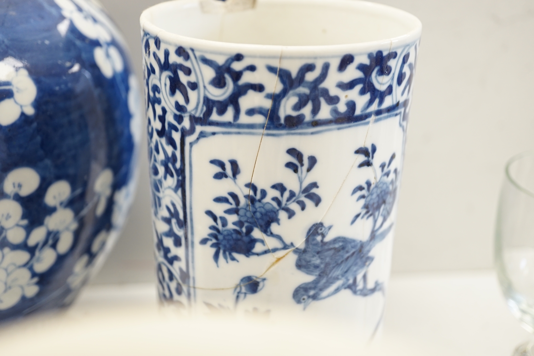 A Chinese blue and white Buddhist lion moon flask, a baluster vase, three sleeve vases and two others, 19th century, tallest 33cms (a.f.)